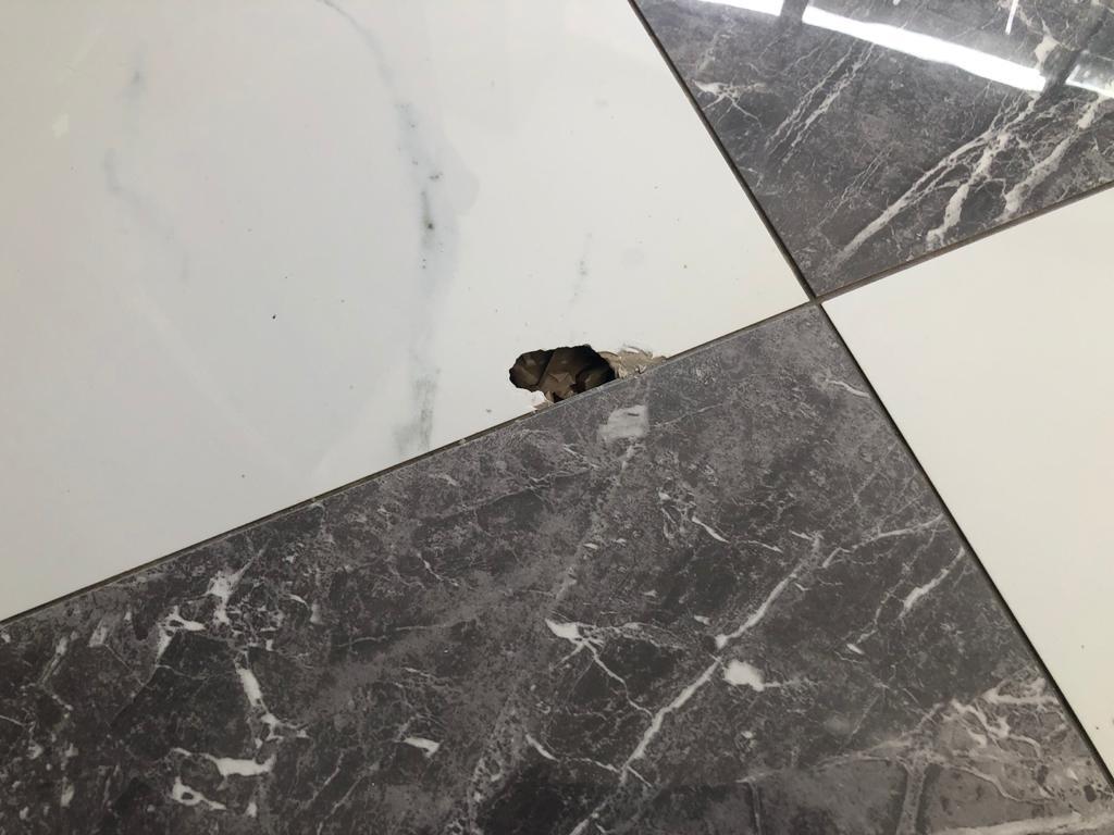 Floor Tile Repair before